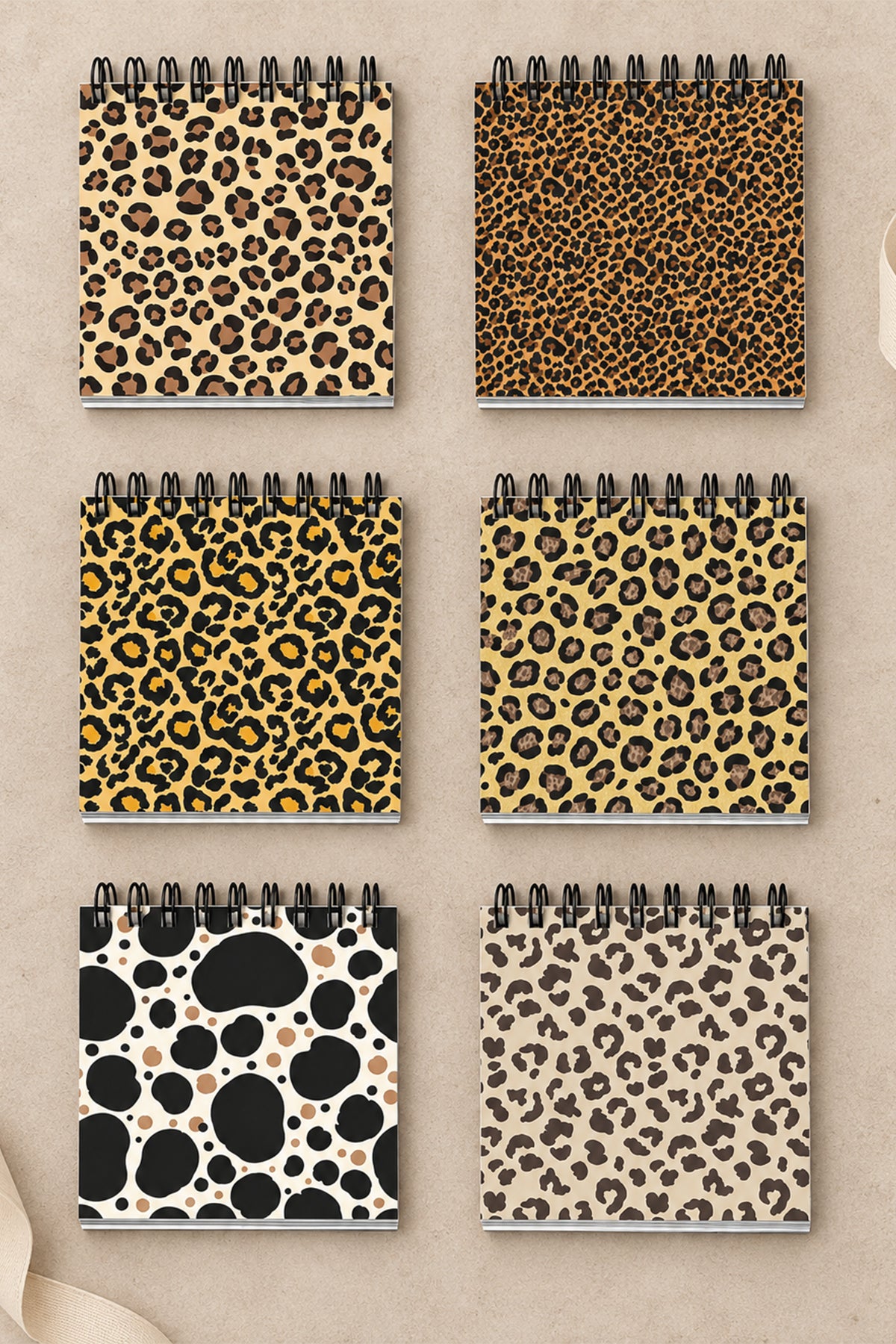 Farkli leopar ve benek desenli mini spiral not defterleri