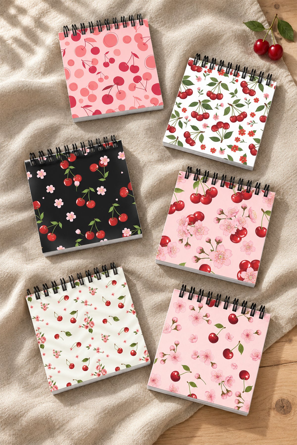 Kirmizi kiraz sakura cicegi ve pembe puantiye desenli mini spiral not defterleri